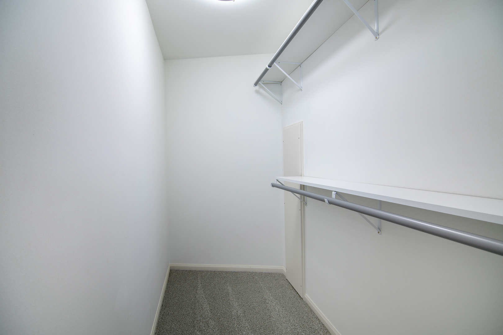 101 Sun Street, Unit A Cabery, IL 60919 - Photo 15 of 26 a view of a room with racks on the wall