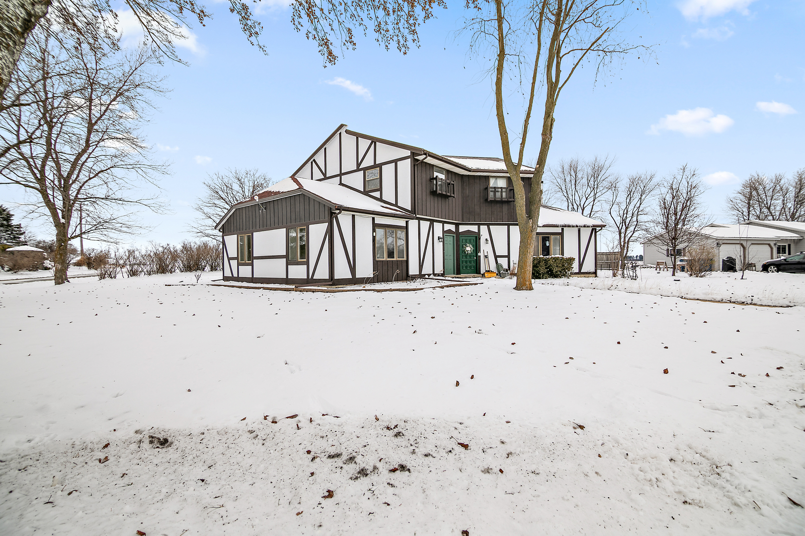 101 Sun Street, Unit A Cabery, IL 60919 - Photo 18 of 26 a view of white house with snow on the road