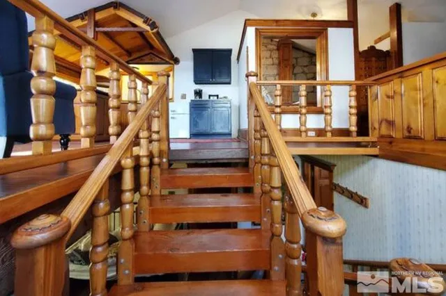 a view of entryway with a front door