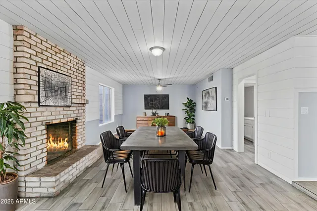 a workspace with furniture and a window