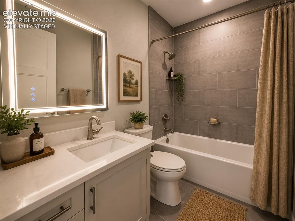3145 Promise Point Colorado Springs, CO 80921 - Photo 5 of 28 Full Bathroom with Quartz Countertop, Heated Lighted Mirror. Virtually Staged.