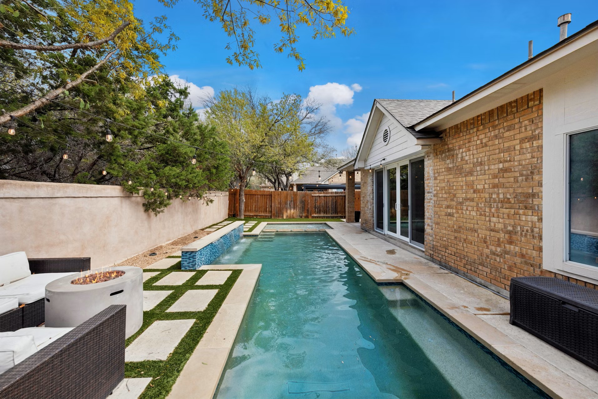 320 El Socorro Lane Austin, TX 78732 - Photo 18 of 40 a view of house with backyard
