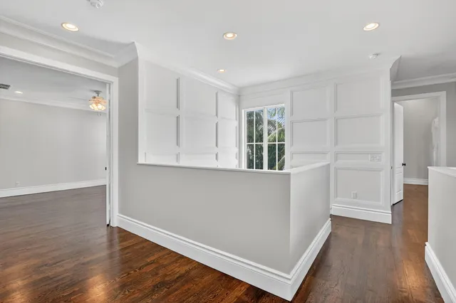 a bathroom with a granite countertop sink a mirror and a shower
