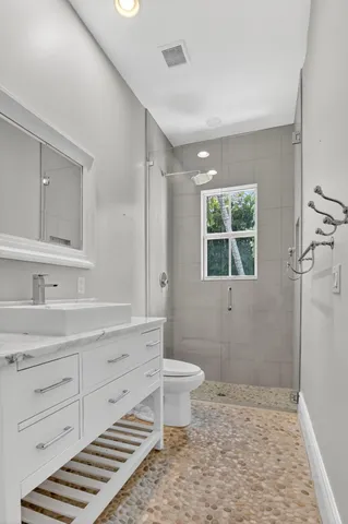 a view of a backyard with swimming pool