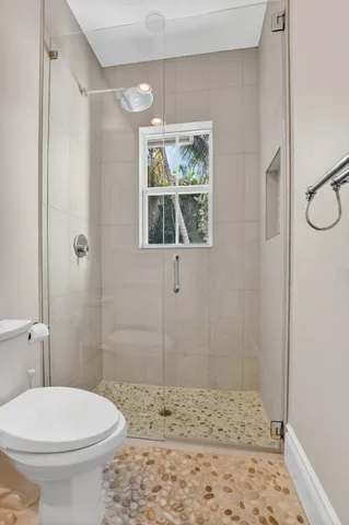 a view of room with wooden floor and window