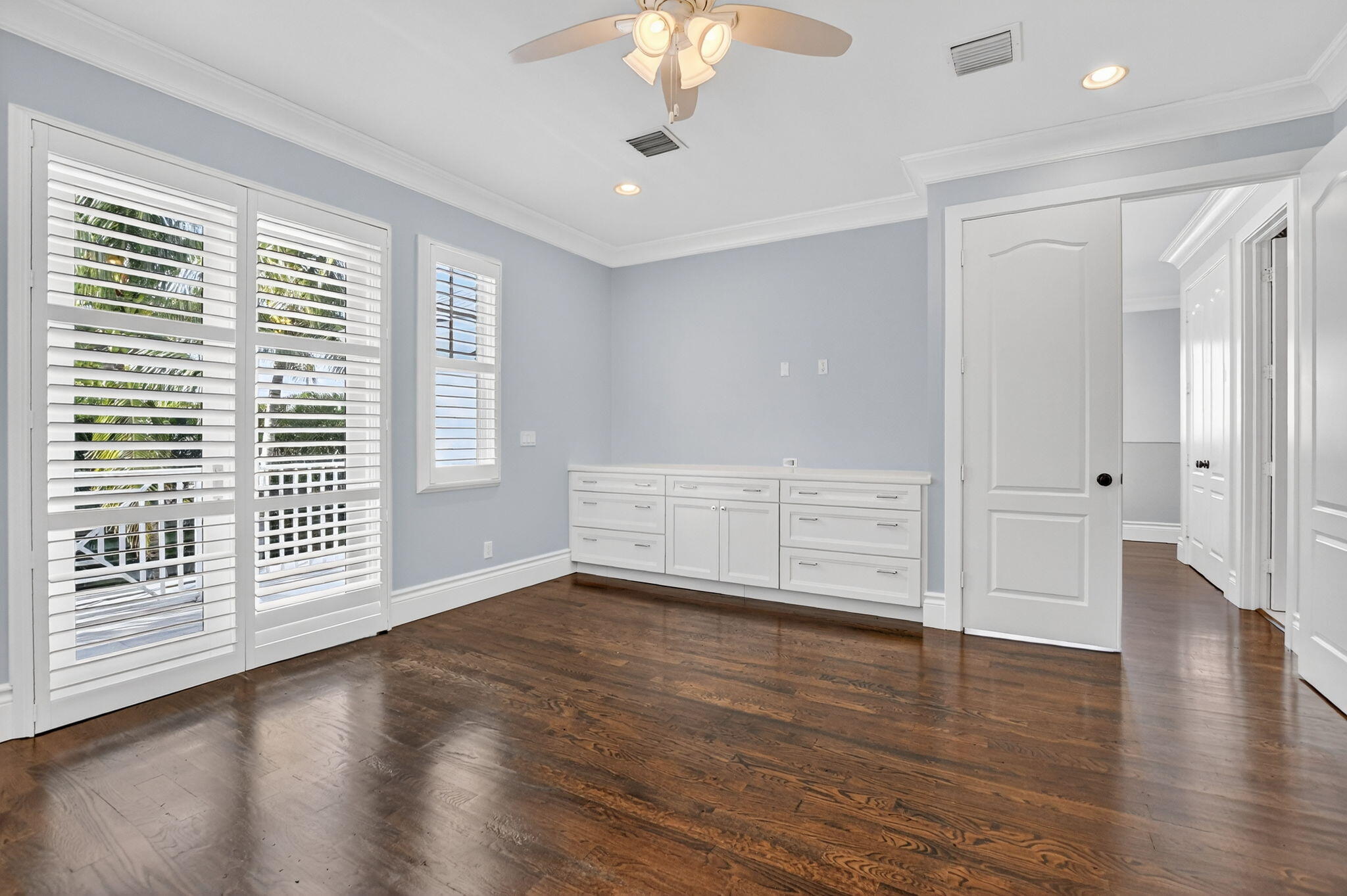 200 Northwest 10th Street Boca Raton, FL 33432 - Photo 51 of 83 a view of an empty room with wooden floor and a window