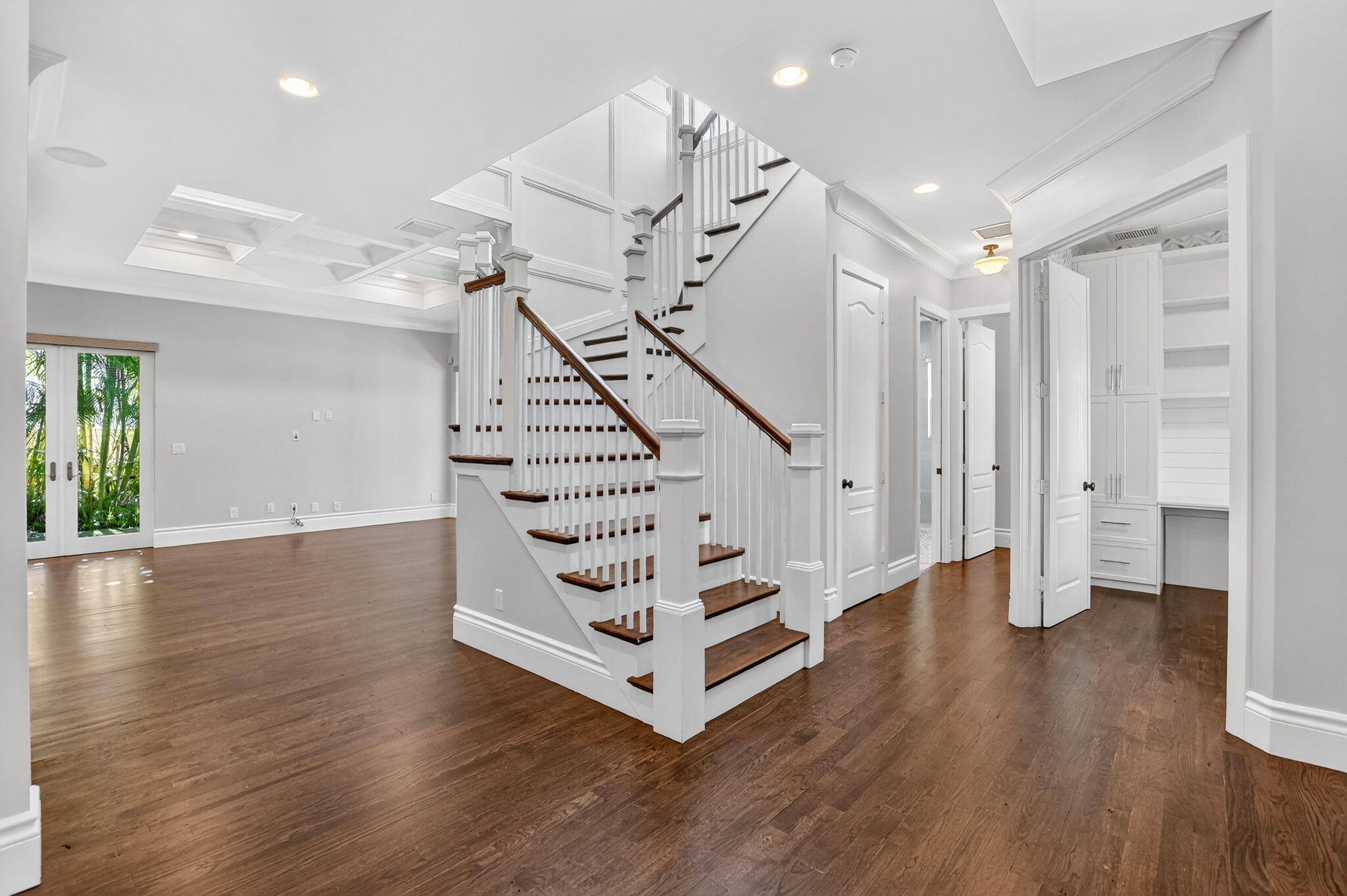 200 Northwest 10th Street Boca Raton, FL 33432 - Photo 6 of 83 a view of entryway with wooden floor and stairs