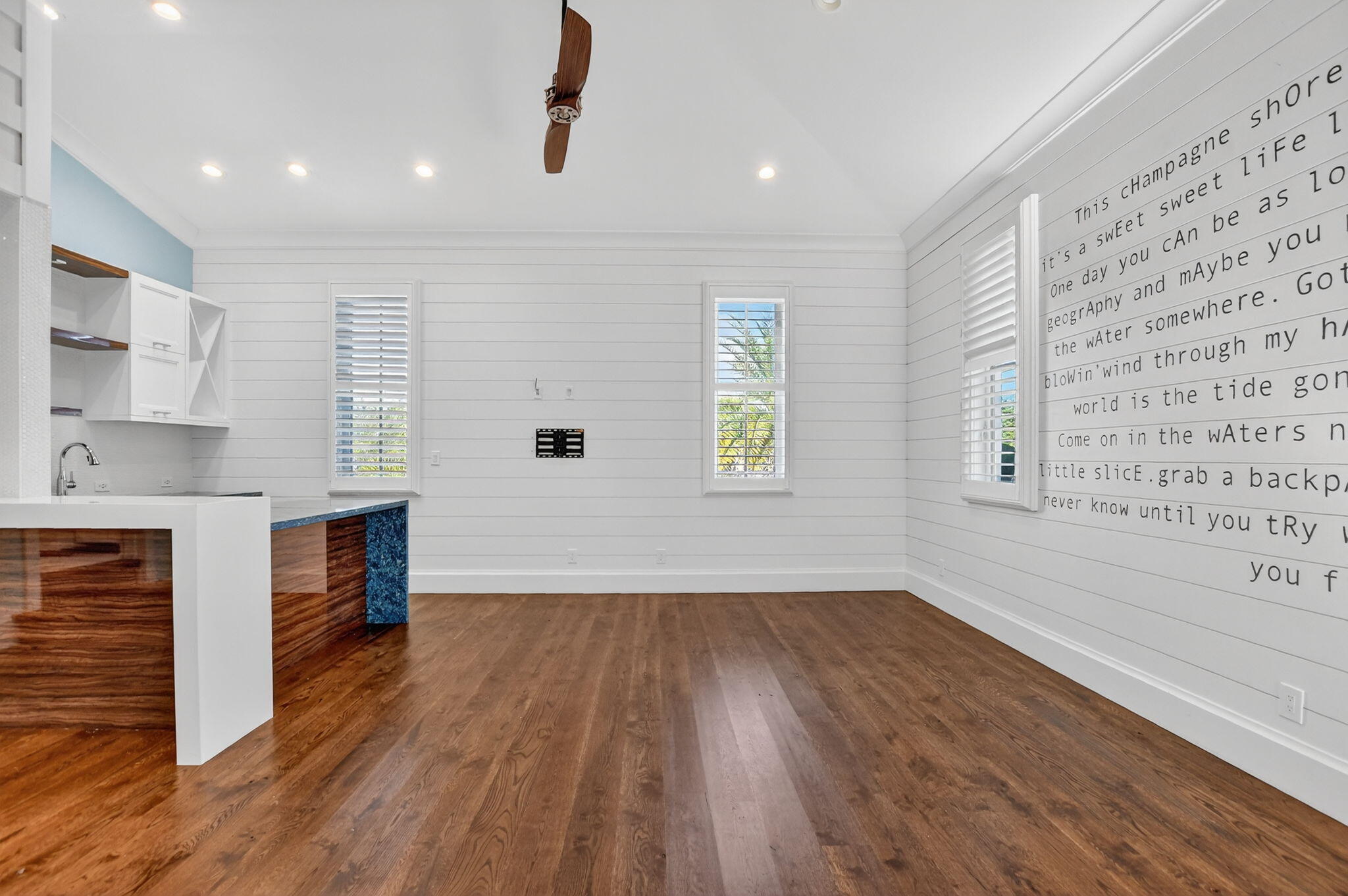200 Northwest 10th Street Boca Raton, FL 33432 - Photo 64 of 83 an empty room with wooden floor and windows