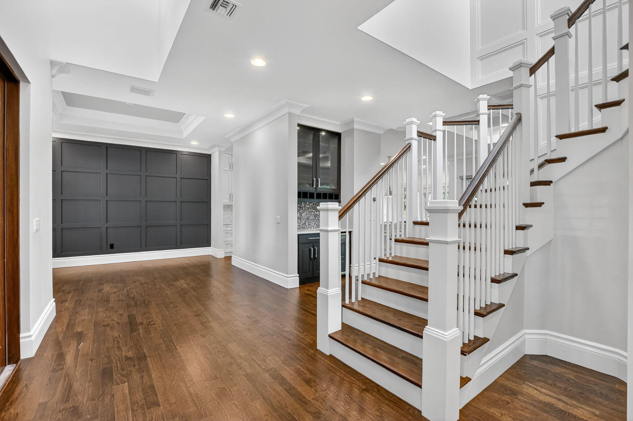 200 Northwest 10th Street Boca Raton, FL 33432 - Photo 7 of 83 a view of entryway with wooden floor and stairs