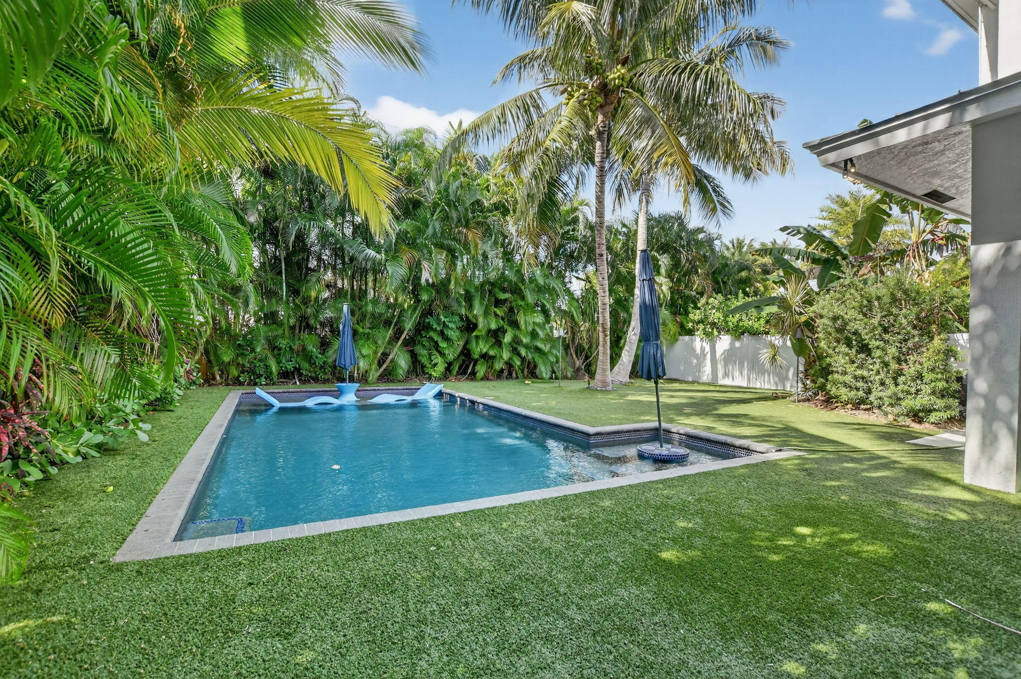 200 Northwest 10th Street Boca Raton, FL 33432 - Photo 72 of 83 a view of a backyard with swimming pool