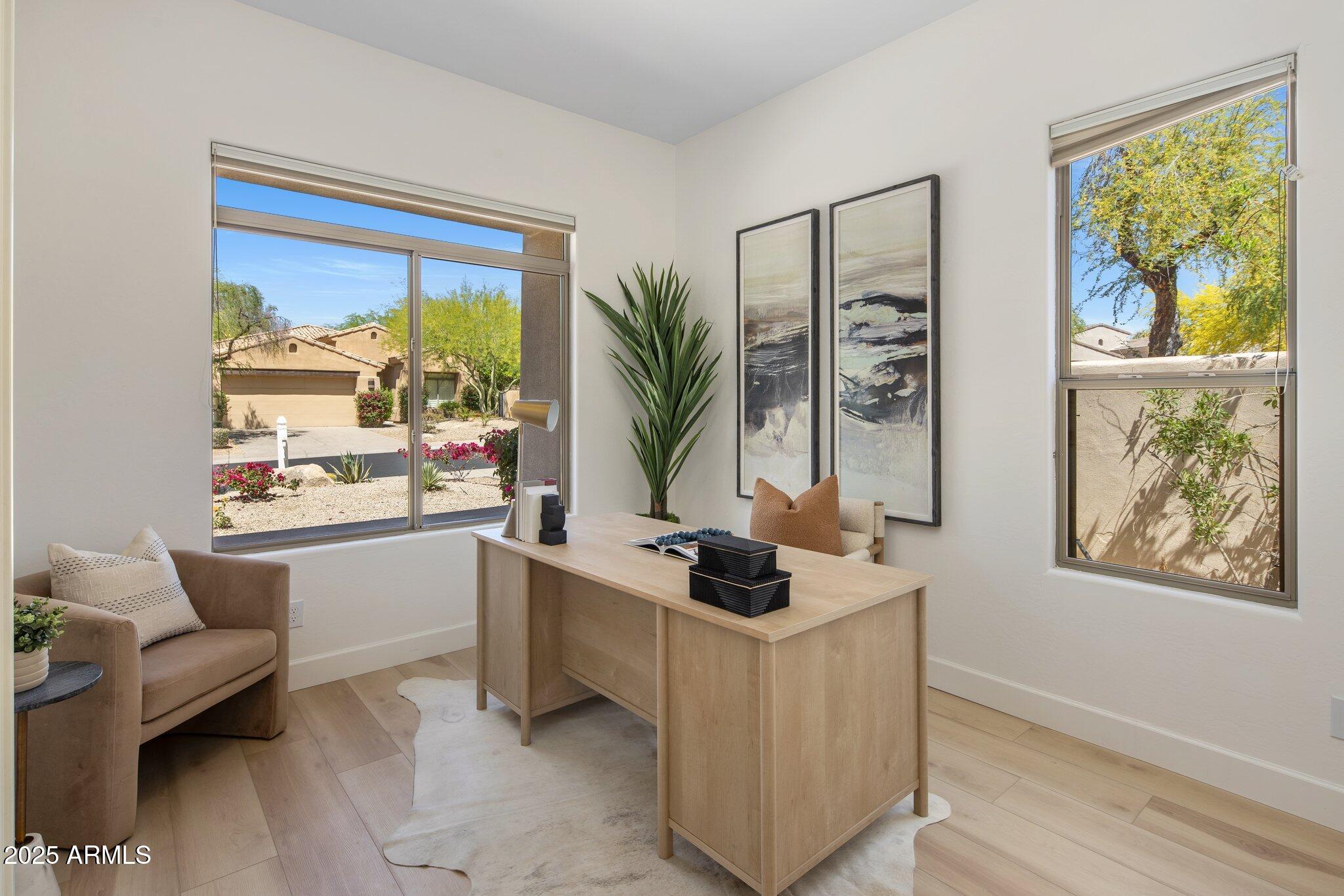 8227 East Beardsley Road Scottsdale, AZ 85255 - Photo 12 of 20 a living room with furniture and a large window