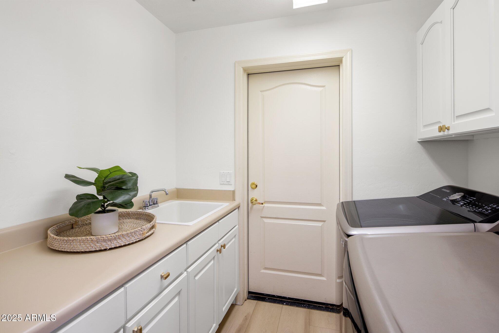 8227 East Beardsley Road Scottsdale, AZ 85255 - Photo 18 of 20 a close view of sink and tap