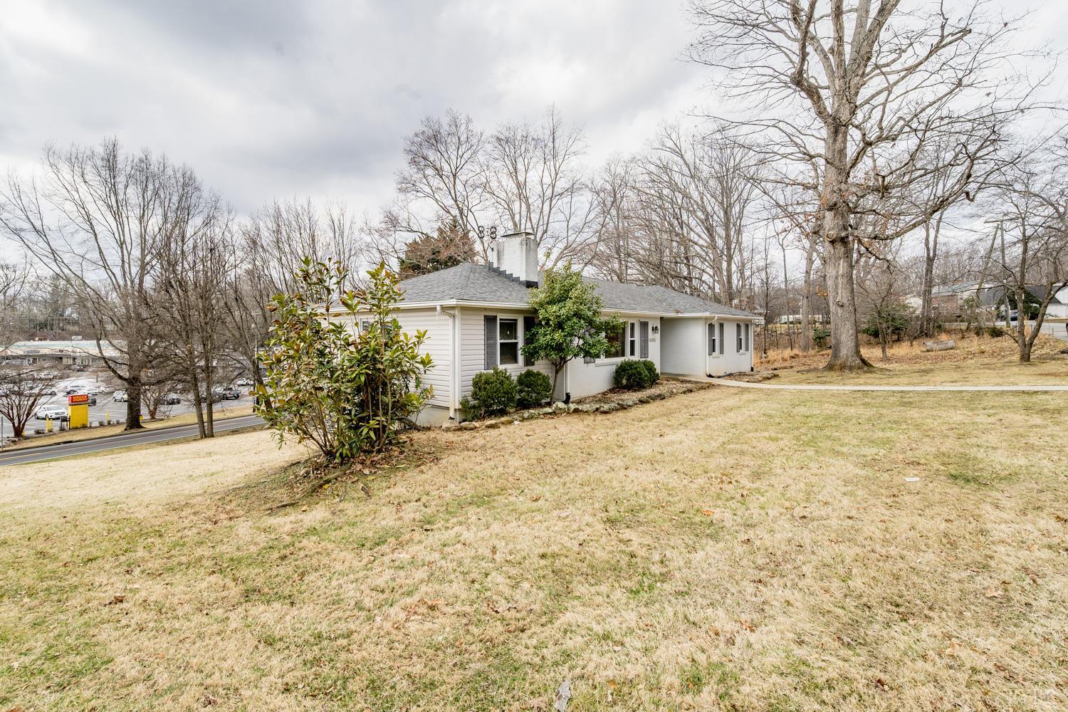 4925 Old Boonsboro Road Lynchburg, VA 24503 - Photo 53 of 57 a front view of a house with a yard and trees