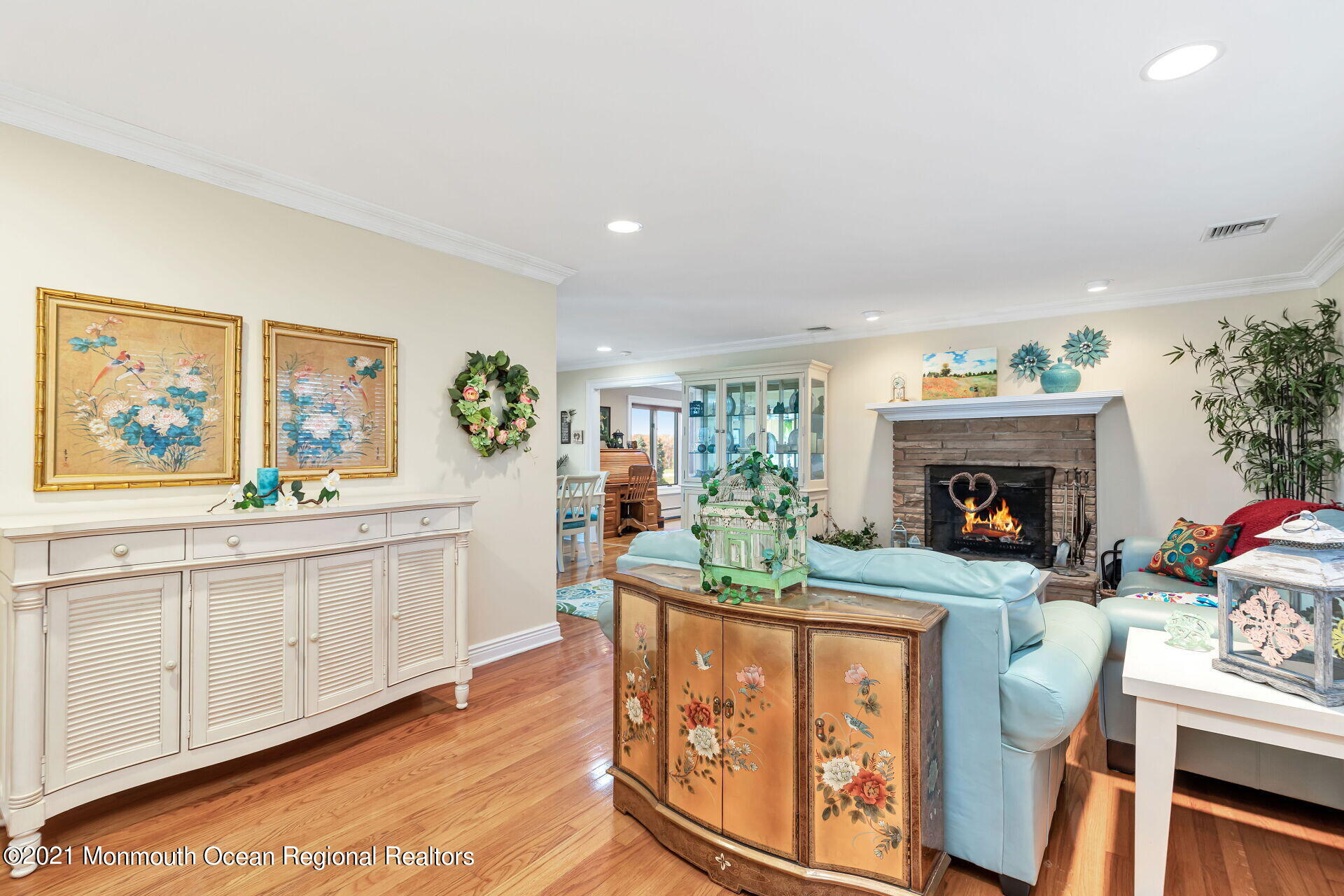 81 Portland Road Atlantic Highlands, NJ 07716 - Photo 15 of 65 a living room with furniture a fireplace and wall paintings