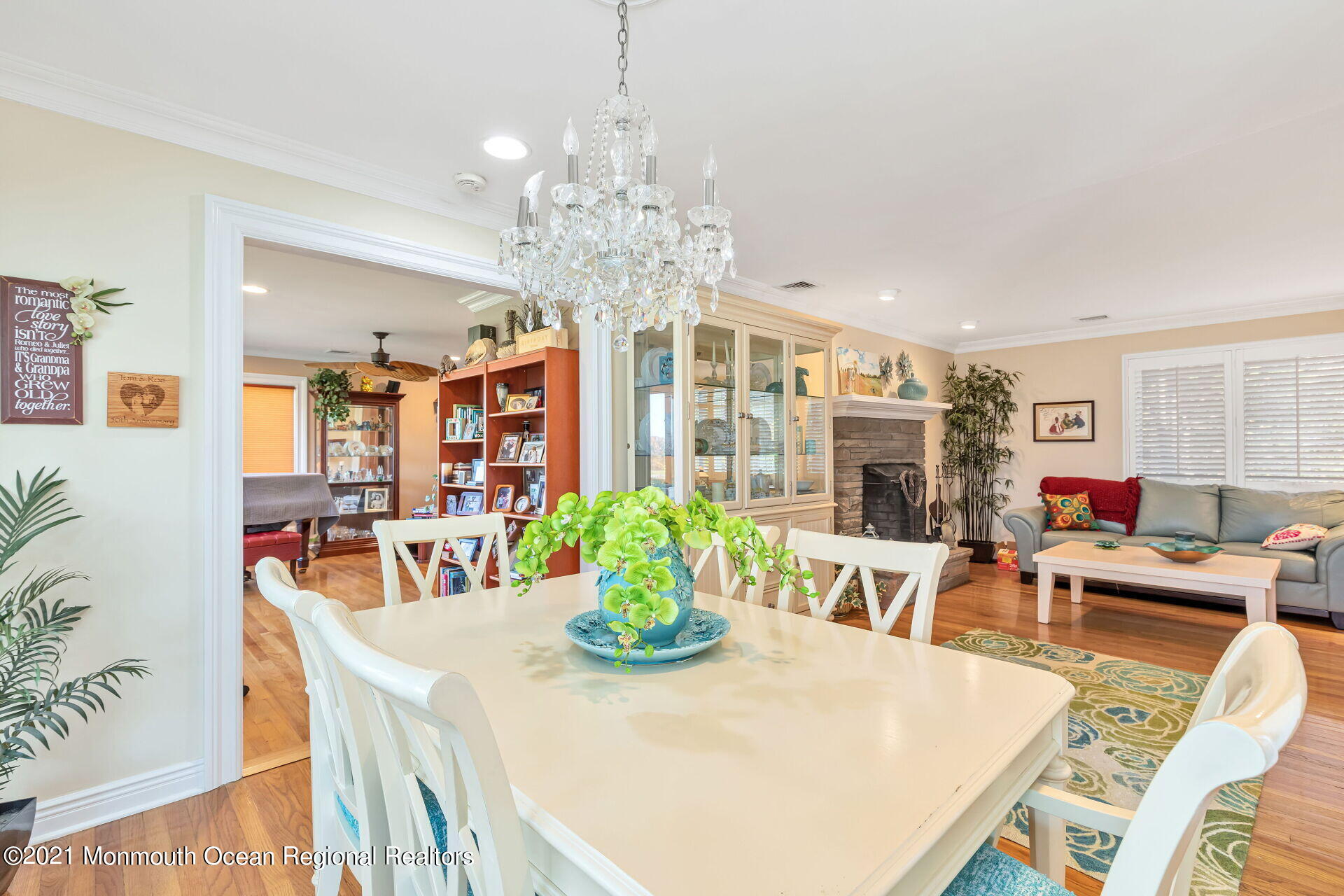 81 Portland Road Atlantic Highlands, NJ 07716 - Photo 20 of 65 a view of a dining room with furniture a livingroom and chandelier