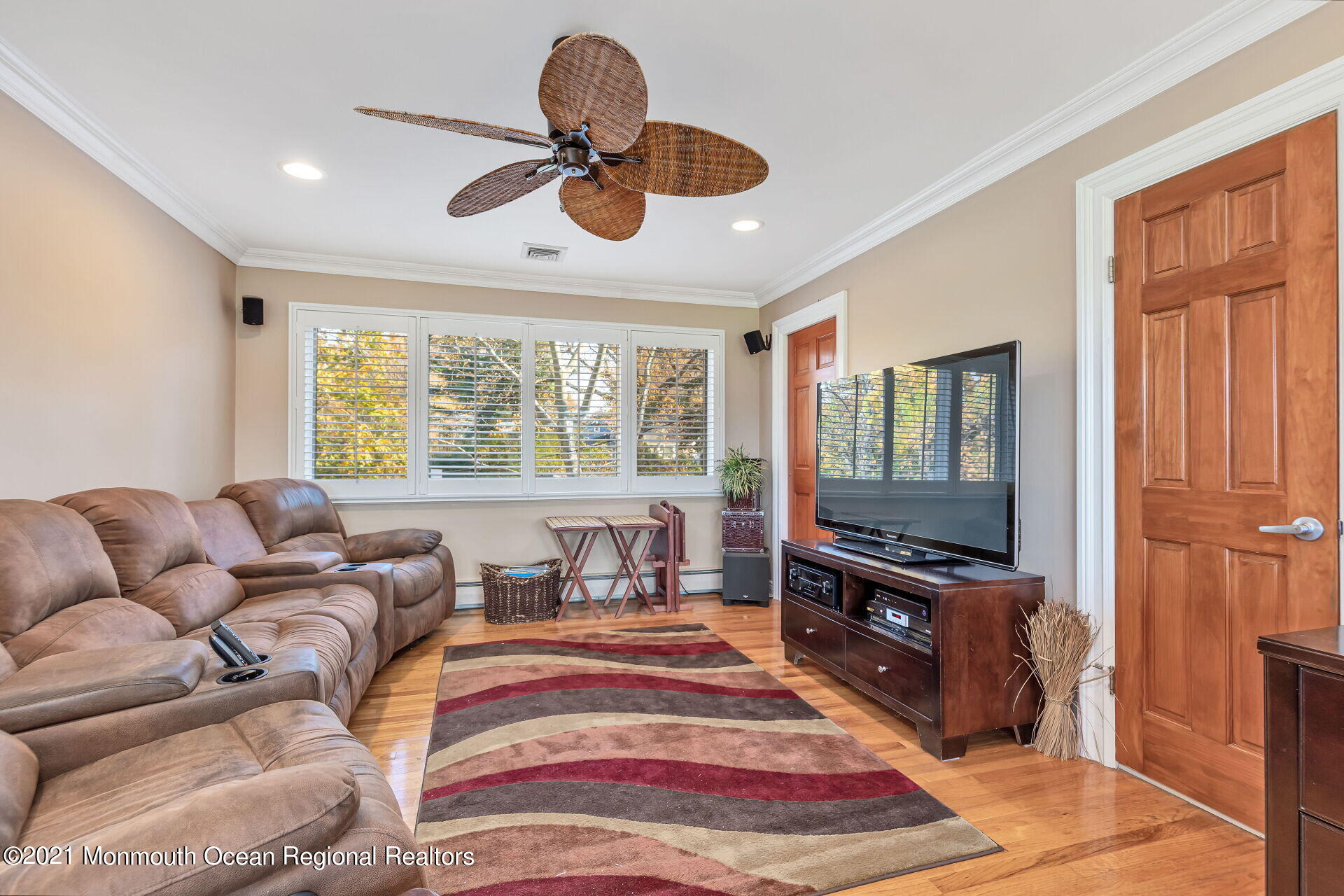 81 Portland Road Atlantic Highlands, NJ 07716 - Photo 24 of 65 a bedroom with a bed and wooden floor