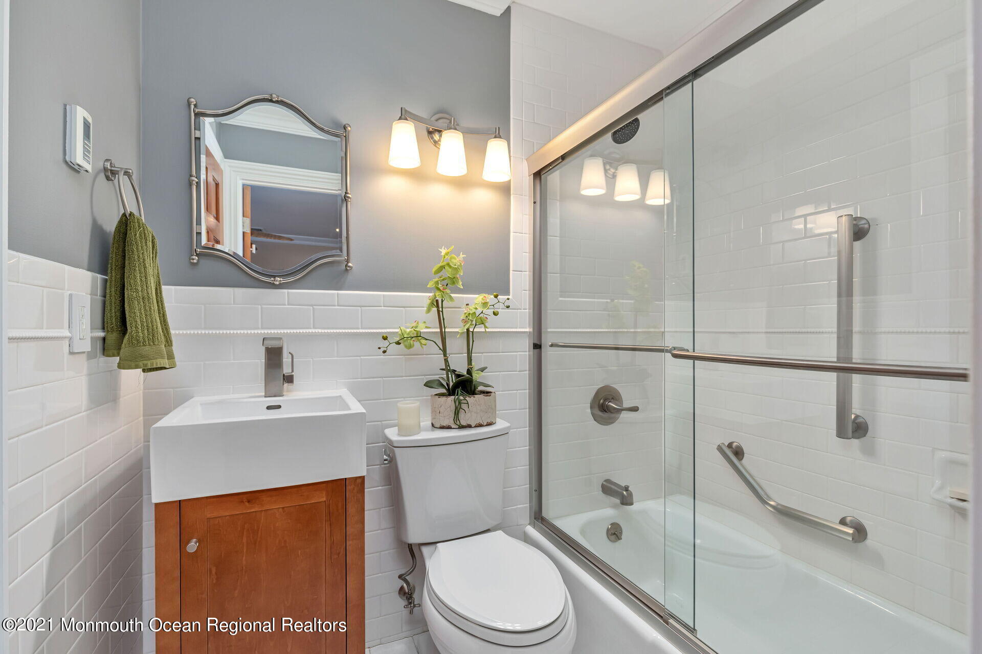 81 Portland Road Atlantic Highlands, NJ 07716 - Photo 26 of 65 a bathroom with a sink a toilet and shower