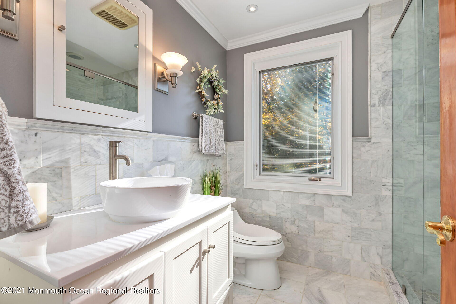 81 Portland Road Atlantic Highlands, NJ 07716 - Photo 28 of 65 a bathroom with a sink a toilet and shower