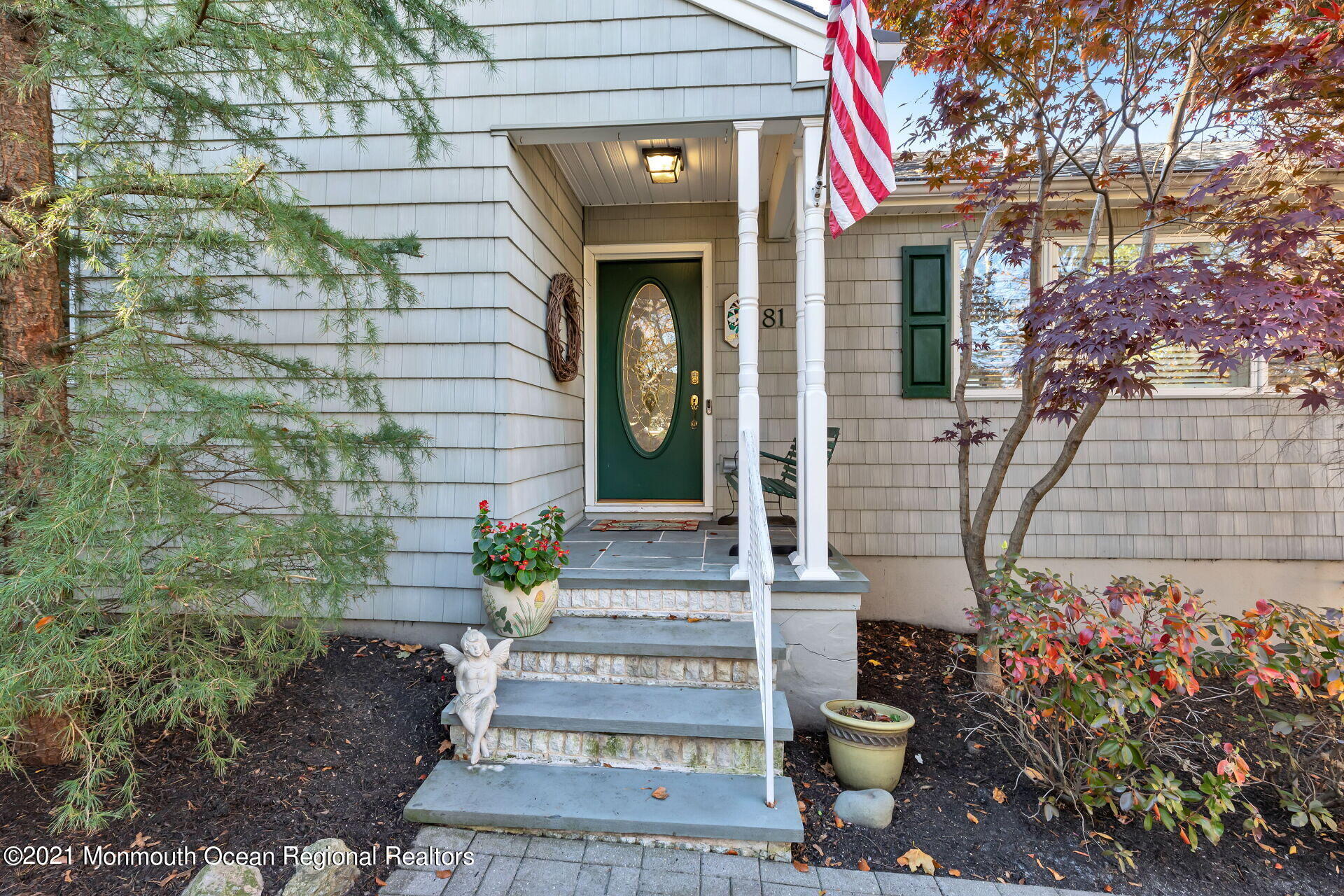 81 Portland Road Atlantic Highlands, NJ 07716 - Photo 8 of 65 a front view of a house with plants