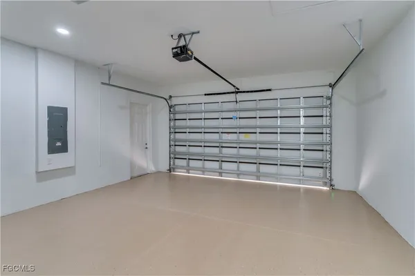 a view of an empty room with a windows