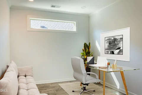 a bathroom with a double vanity sink mirror and shower