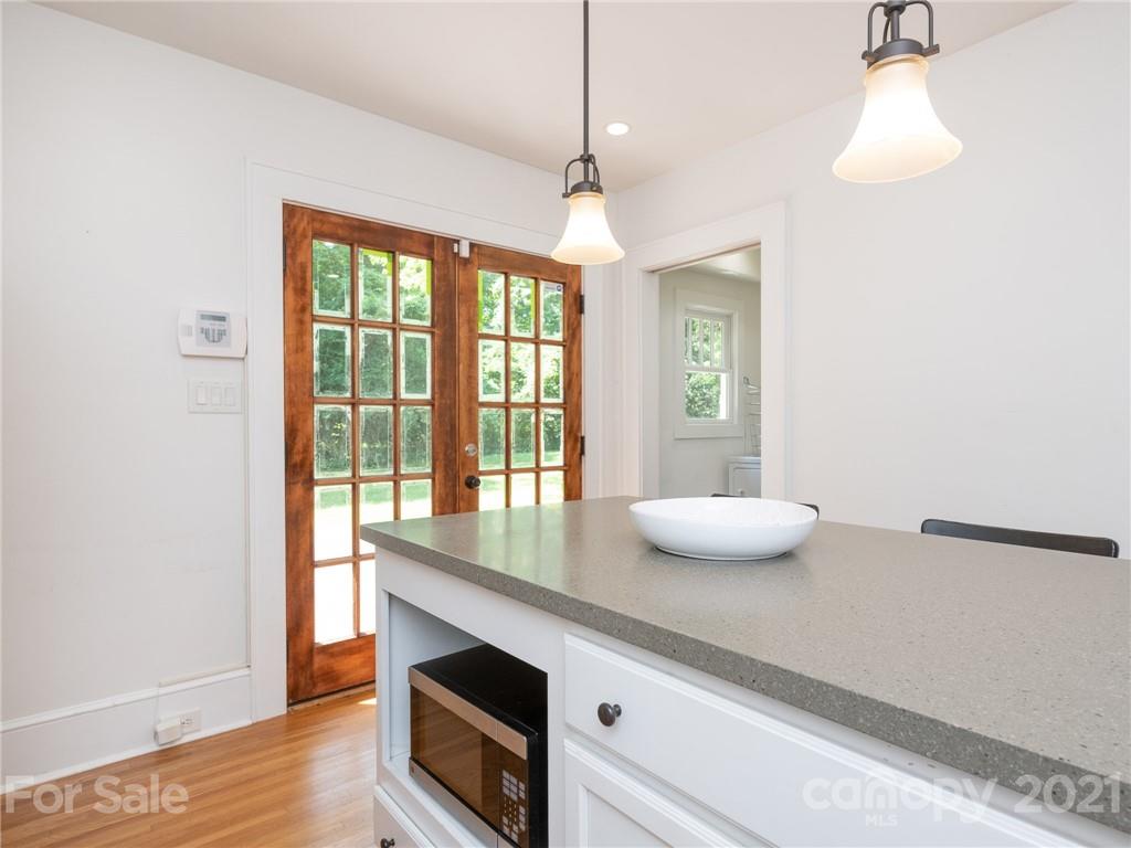 3514 Kelly Road Charlotte, NC 28216 - Photo 16 of 34 a kitchen with a sink and a window