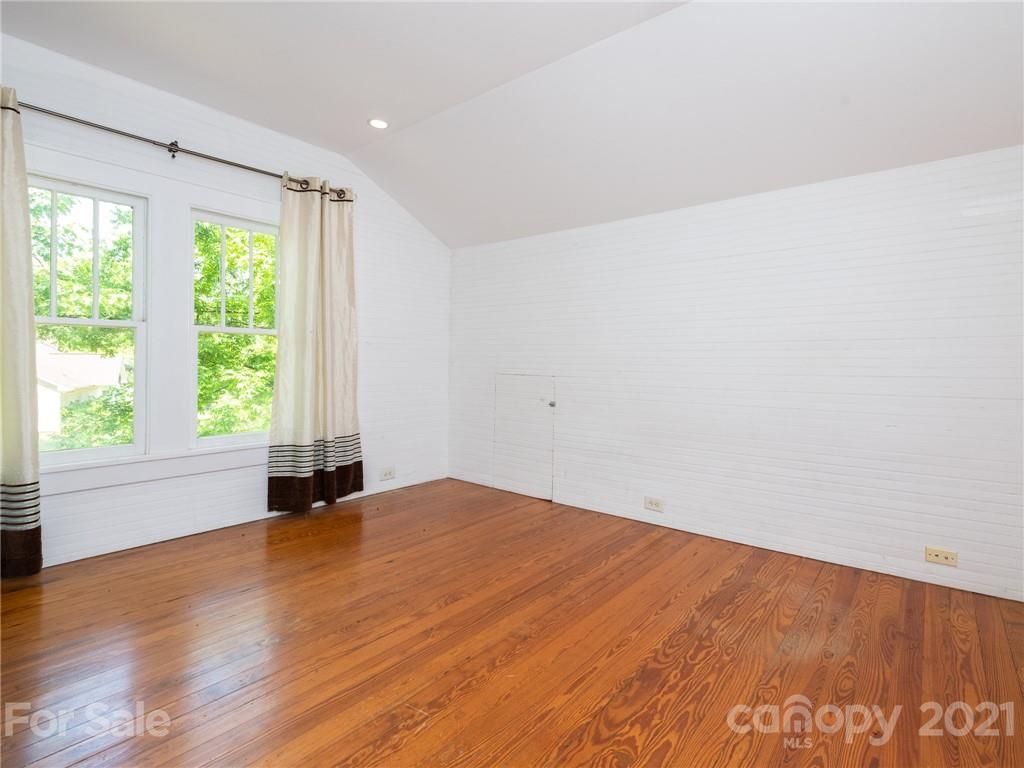 3514 Kelly Road Charlotte, NC 28216 - Photo 29 of 34 a view of an empty room with wooden floor and a window