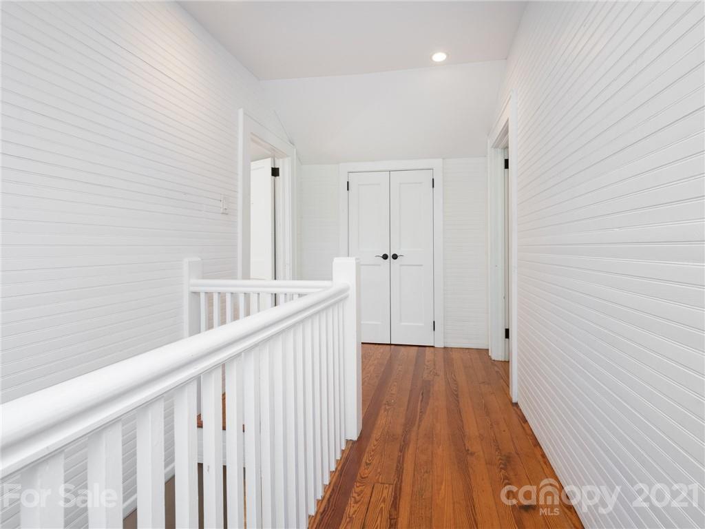 3514 Kelly Road Charlotte, NC 28216 - Photo 4 of 34 a view of a hallway with wooden floor