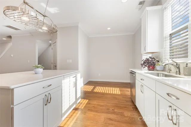 a spacious bathroom with a double vanity sink mirror and