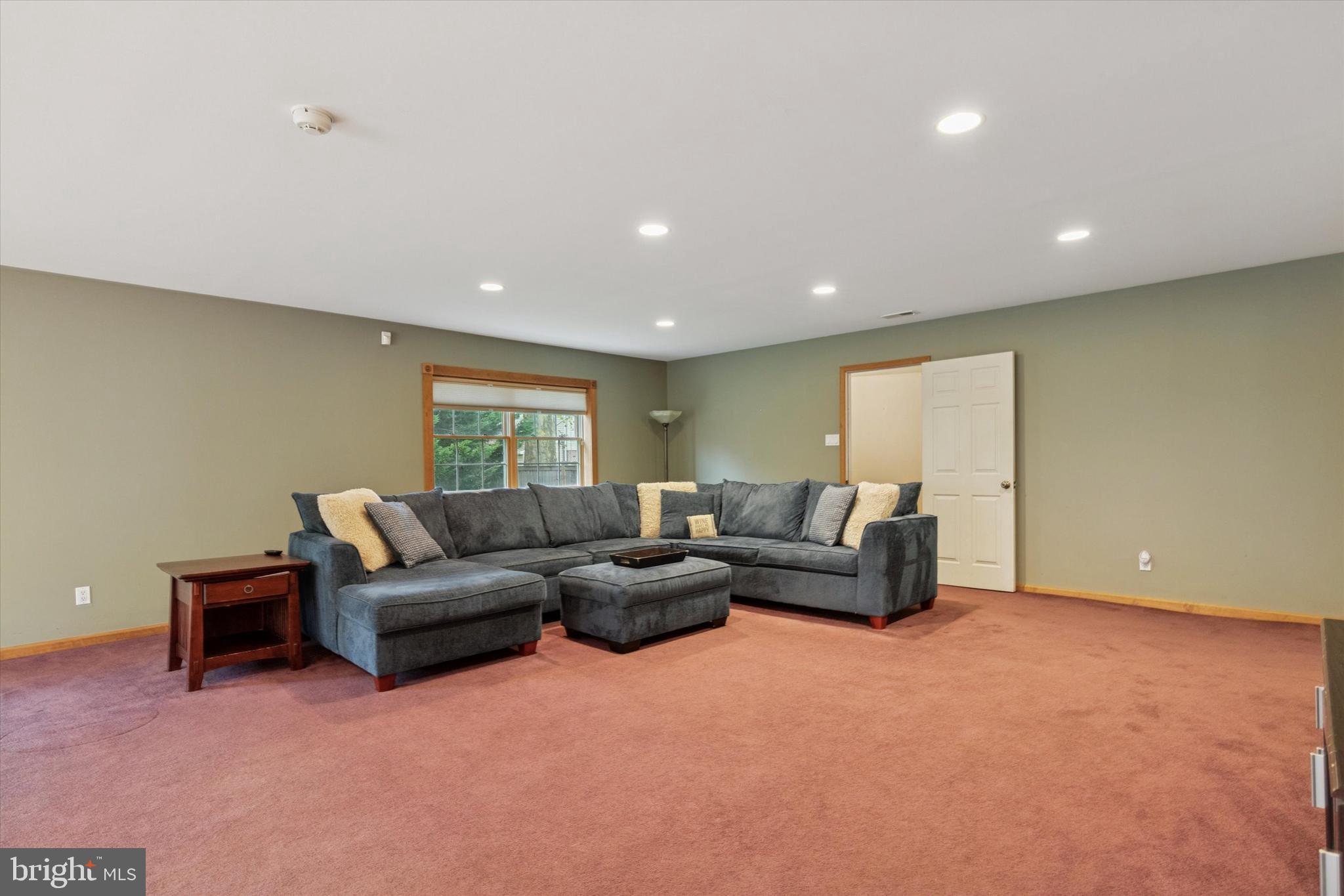 4114 Pilgrim Road Plymouth Meeting, PA 19462 - Photo 11 of 36 a living room with furniture and a couch