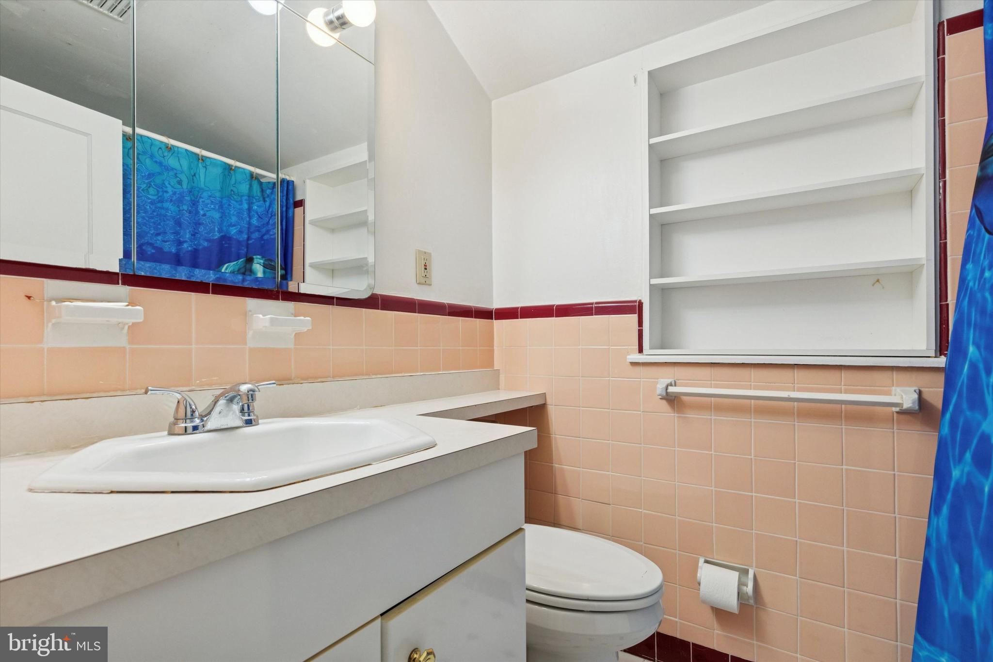 4114 Pilgrim Road Plymouth Meeting, PA 19462 - Photo 25 of 36 a bathroom with a sink toilet and vanity