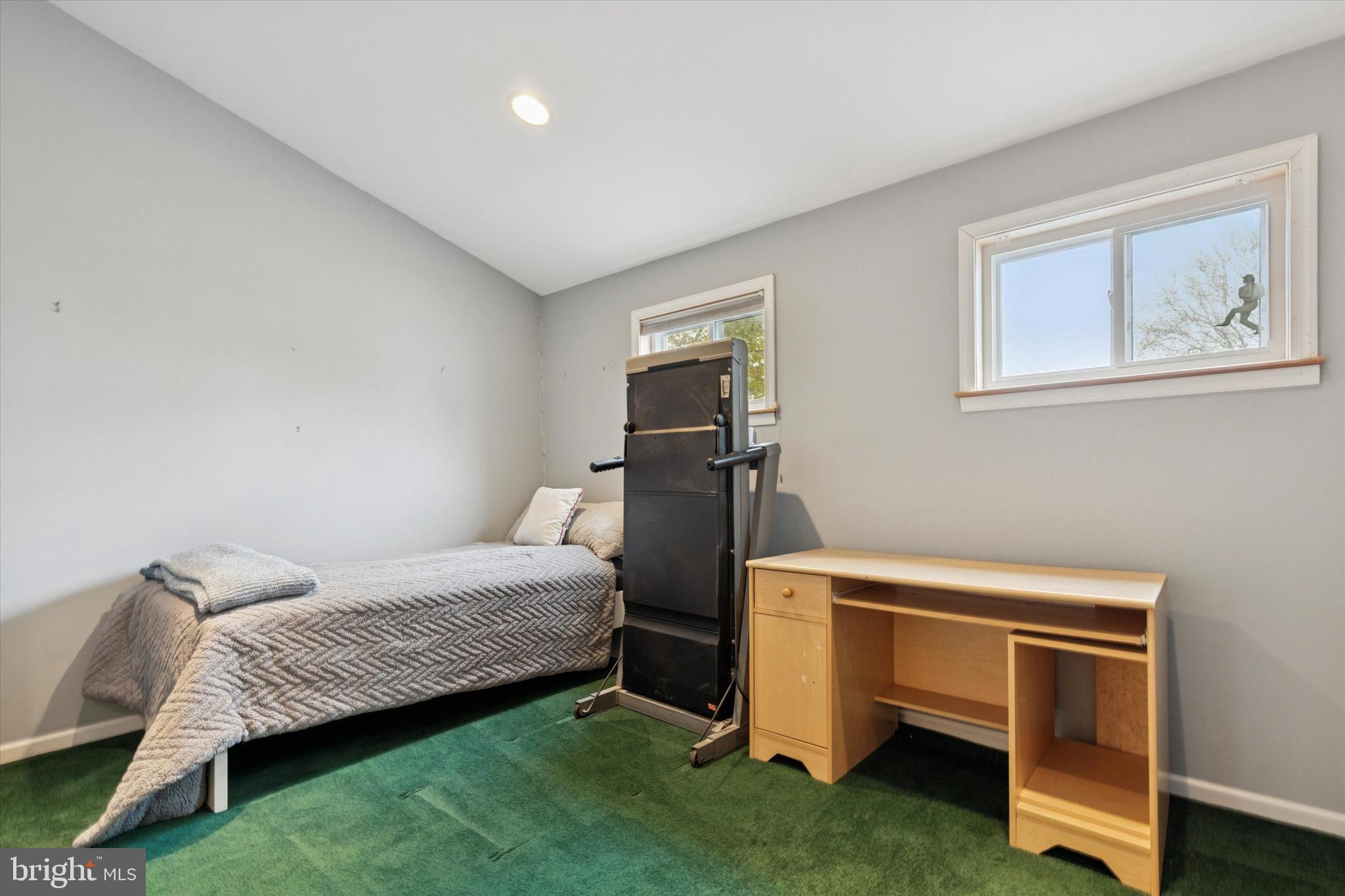 4114 Pilgrim Road Plymouth Meeting, PA 19462 - Photo 28 of 36 a bedroom with a bed and a desk