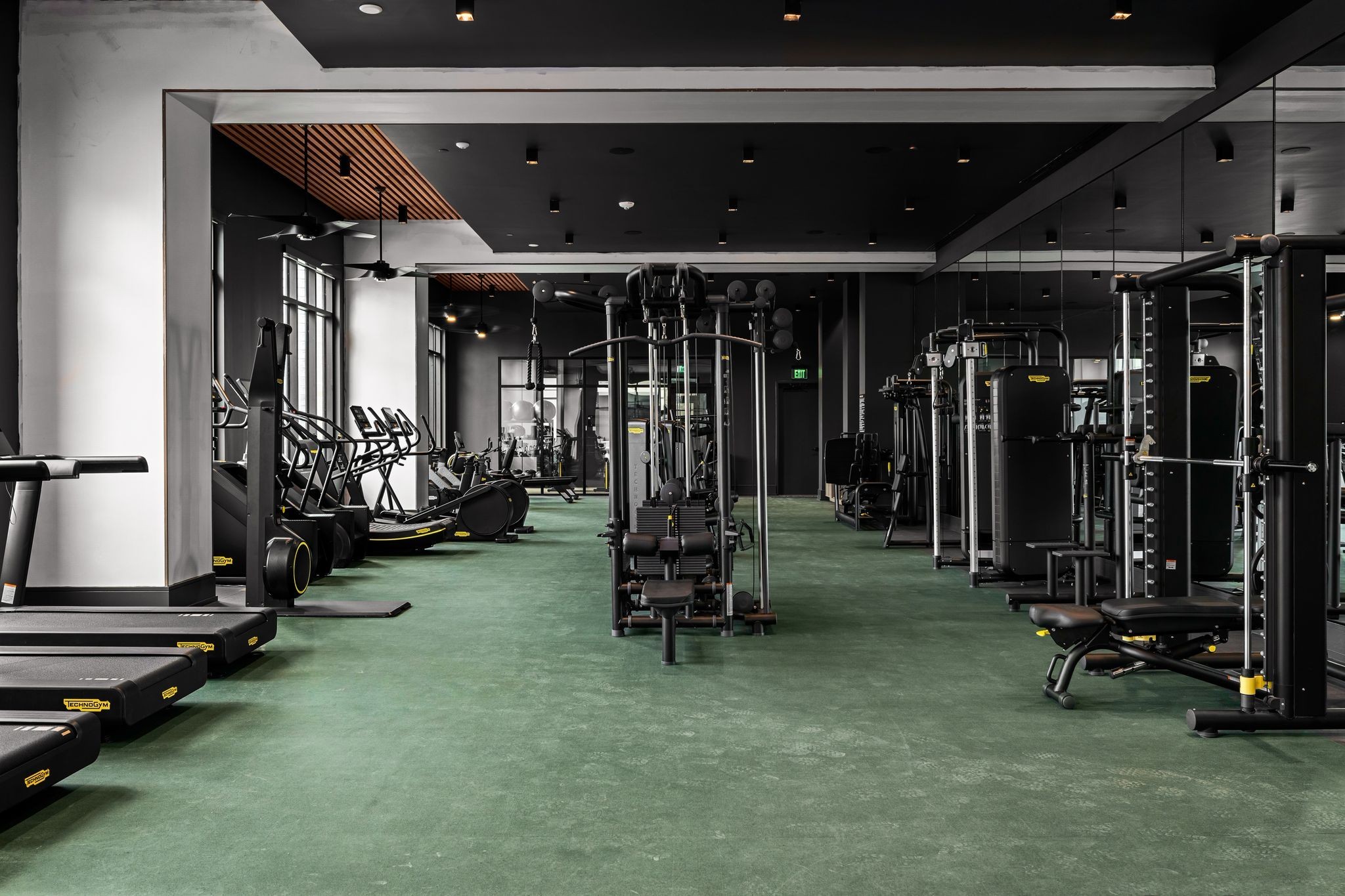 930 Commerce Street, Unit 18 Nashville, TN 37203 - Photo 16 of 31 a room with gym equipment and a gym machine