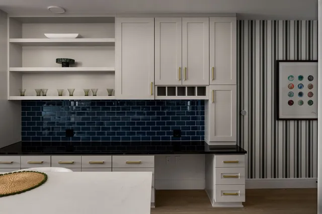 a bathroom with a sink and a window