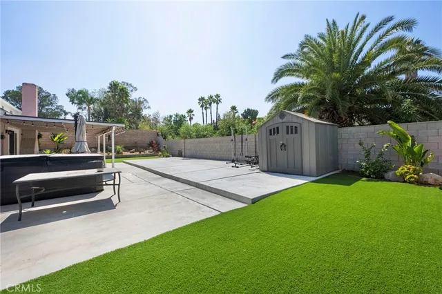 a backyard of a house with lots of green space