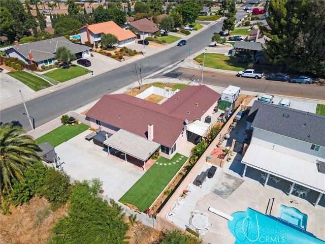 an aerial view of a house with a garden