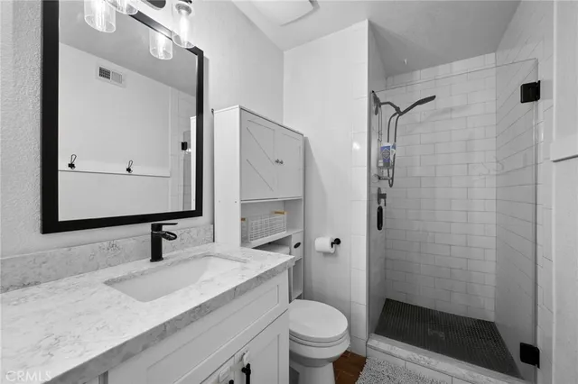 a view of a kitchen with washer and dryer