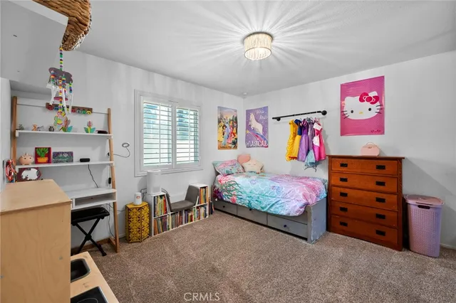 a view of a swimming pool with a chairs