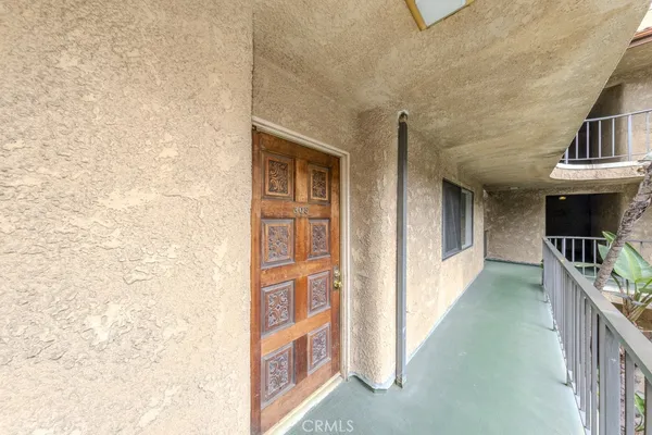 a view of a building with a yard