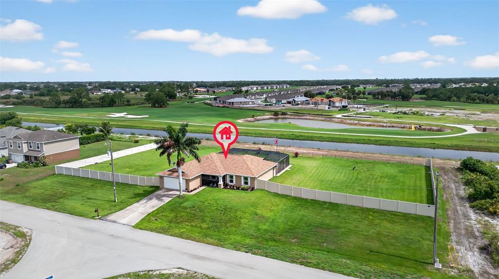 a view of a golf course with a park