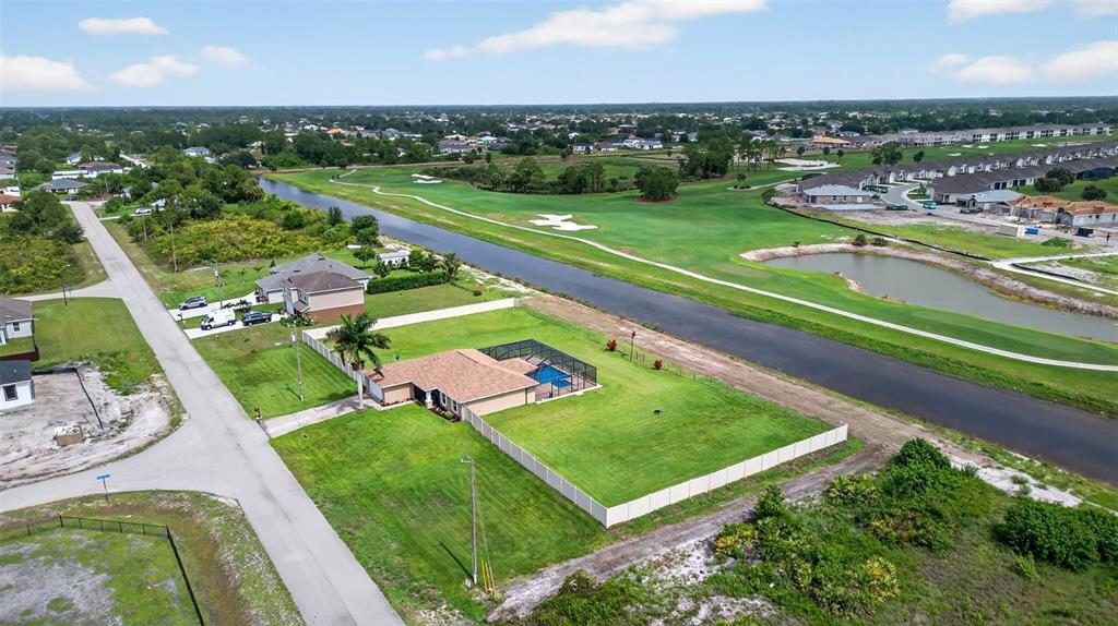 125 Paddock Street Lehigh Acres, FL 33974 - Photo 37 of 45 an aerial view of a football ground