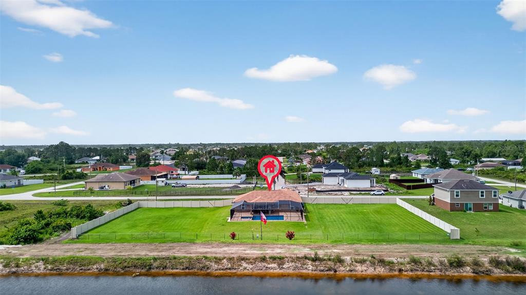 125 Paddock Street Lehigh Acres, FL 33974 - Photo 42 of 45 a view of a city