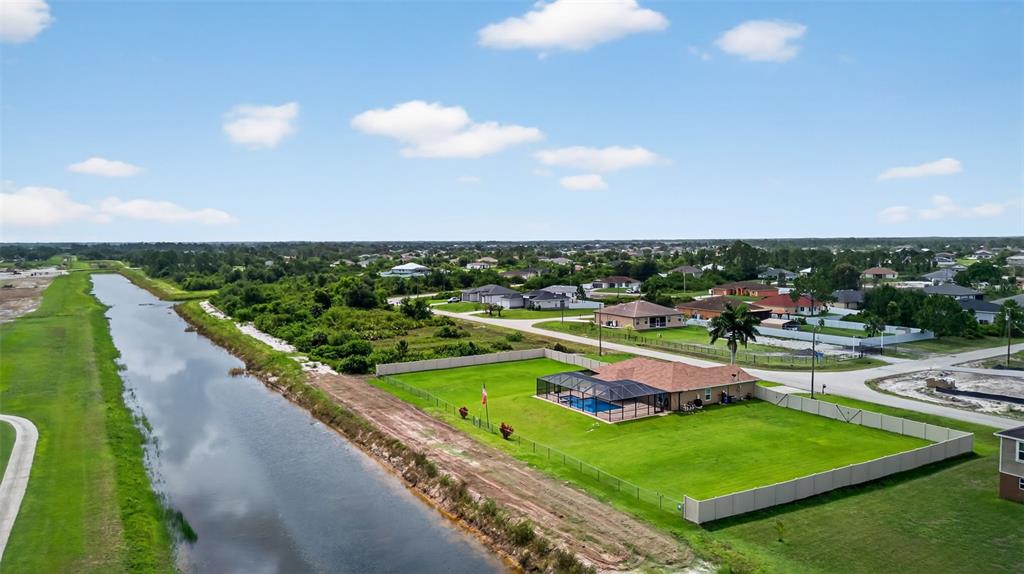 125 Paddock Street Lehigh Acres, FL 33974 - Photo 43 of 45 an aerial view of a city