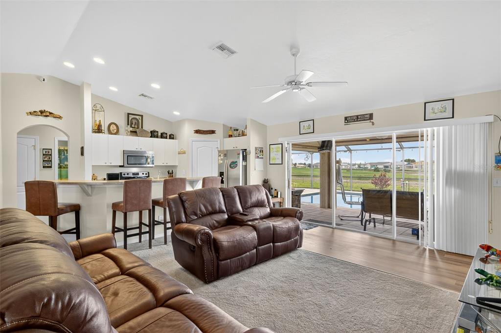 125 Paddock Street Lehigh Acres, FL 33974 - Photo 10 of 45 a living room with furniture and a large window