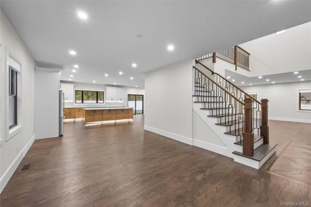 a view of kitchen with furniture and wooden floor
