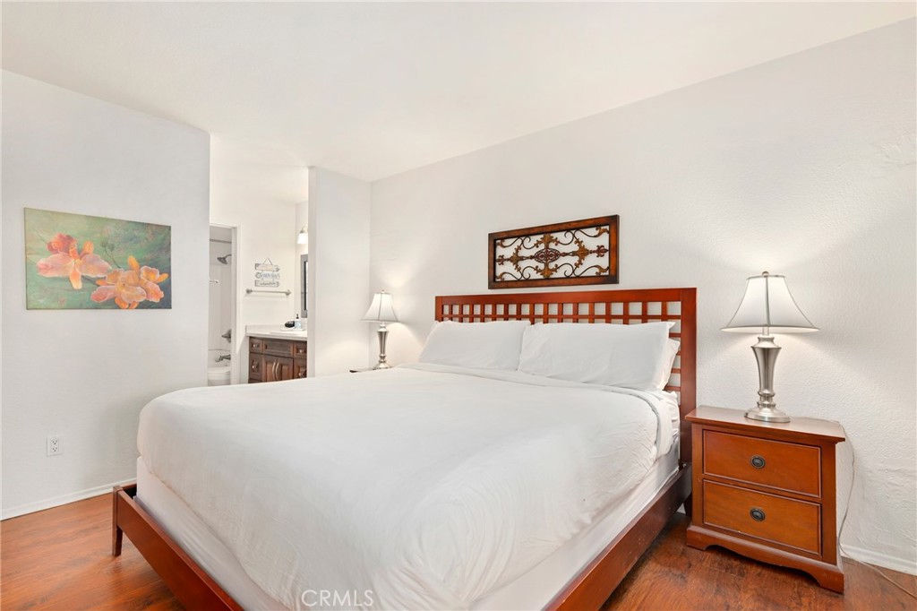 14 Corniche Drive, Unit A Dana Point, CA 92629 - Photo 15 of 49 a bedroom with a bed and a dresser