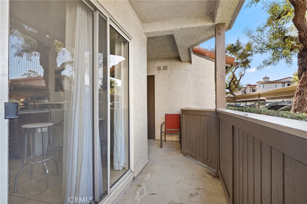 14 Corniche Drive, Unit A Dana Point, CA 92629 - Photo 26 of 49 a view of a balcony with furniture and a city view