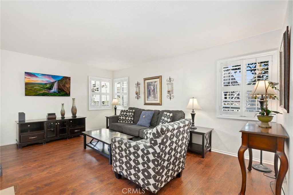 14 Corniche Drive, Unit A Dana Point, CA 92629 - Photo 3 of 49 a living room with furniture and a flat screen tv