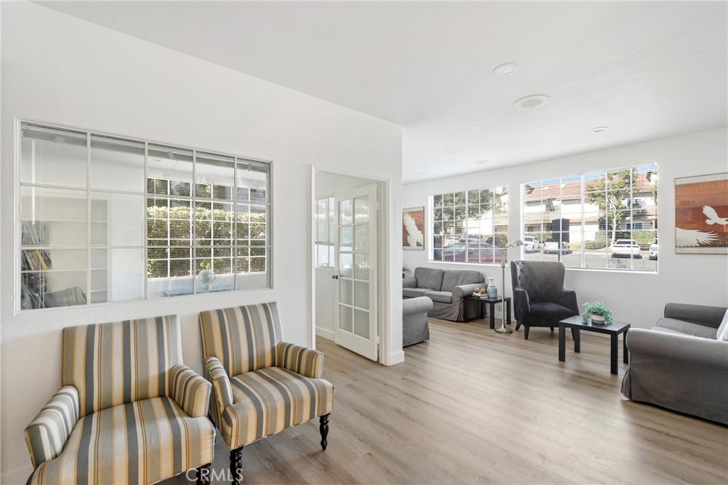 14 Corniche Drive, Unit A Dana Point, CA 92629 - Photo 35 of 49 a living room with furniture and a large window