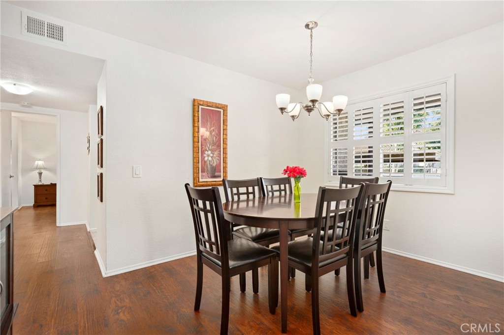 14 Corniche Drive, Unit A Dana Point, CA 92629 - Photo 6 of 49 a view of a dining room with furniture and wooden floor